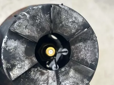 Burner head and nozzle assembly from Nilfisk Contractor diesel hot pressure washer during boiler repair.